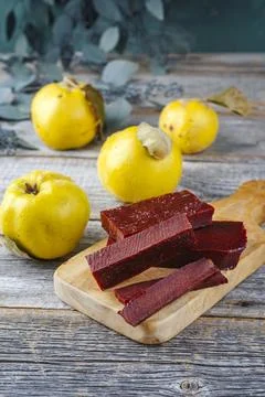 Traditional Spanish dulce de membrillo as fruit bread with quince as close-up Stock Photos