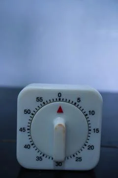 Traditional square manual timer as a timer in the laboratory Stock Photos