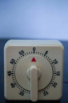 Traditional square manual timer as a timer in the laboratory Stock Photos