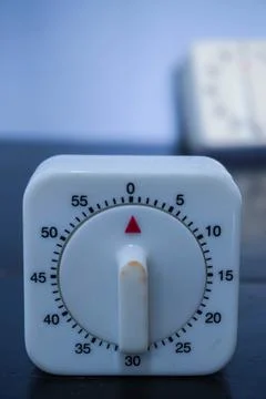 Traditional square manual timer as a timer in the laboratory Foto stock