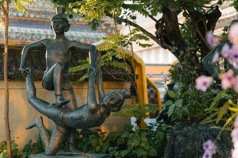 Traditional stone statues inside the courtyard of Wat Pho temple, Thailand, 31 Stock Photos