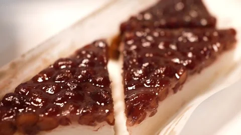 Traditional sweet red bean paste and uirou cake, Minazuki for summer festival Stock Footage 336636154