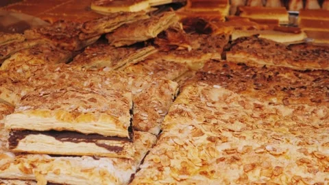 Traditional sweet spanish bread with coco, coconut dessert on market in Stock Footage 198256444