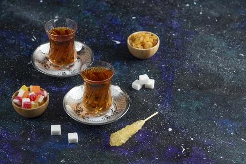 Traditional tea table. fragrant tea with candy Stock Photos