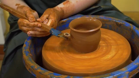 Traditional techniques of creating pots. Potter hands working and making pottery 動画素材 99773053
