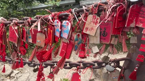 Traditional temple wish tablets with red tassels for luck Stock Footage 341575078