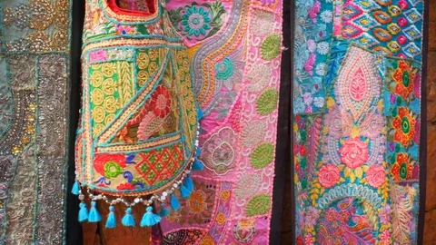 Traditional textile patchwork made of embroidery and stitched out of colored Stock Footage 121812530