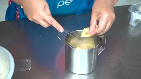 Traditional Thai Egg Roti Cooking on a Hot Griddle at Street Food Market Stock Footage 342555439