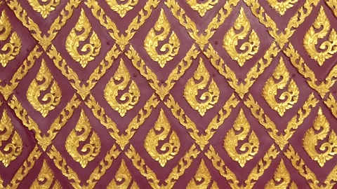 Traditional Thai golden pattern on red background with intricate ornamental Stock Footage 331409618