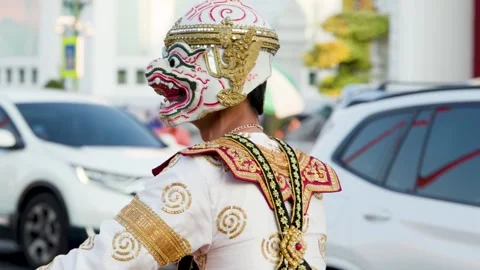 Traditional Thai Khon Performer Dancing in Hanuman Costume Near Giant Swing Stock Footage 332829535