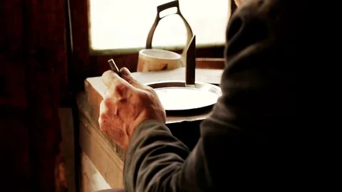 Traditional tinsmith work. Copper smith makes embossing artifacts from copper. D Stock Footage 76442200