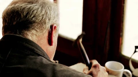 Traditional tinsmith work. Copper smith makes embossing artifacts from copper. D Stock Footage 76442346