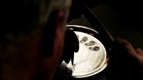 Traditional tinsmith work. Copper smith makes embossing artifacts from copper. D Stock Footage 76442382