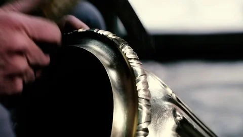 Traditional tinsmith work. Copper smith makes embossing artifacts from copper. D Stock Footage 76442593