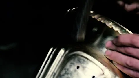 Traditional tinsmith work. Copper smith makes embossing artifacts from copper. D Stock Footage 76442614