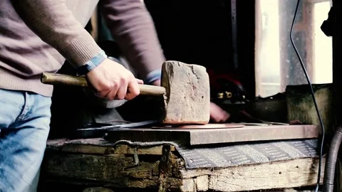 Traditional tinsmith work. Copper smith makes embossing artifacts from copper. D Stock Footage 76442868