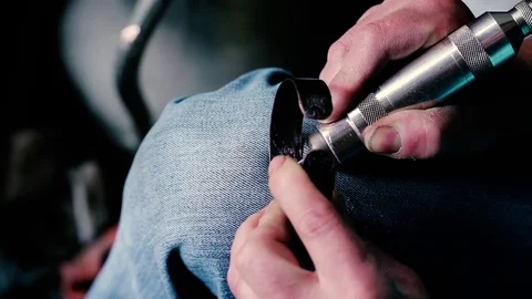 Traditional tinsmith work. Copper smith makes embossing artifacts from copper. D Stock Footage 76443009