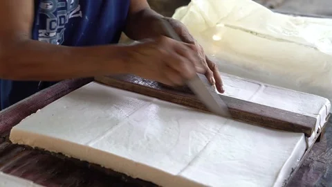 Traditional tofu making Stock Footage 90979229