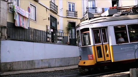 Traditional tram operating in Lisbon  Stock Footage 57089086