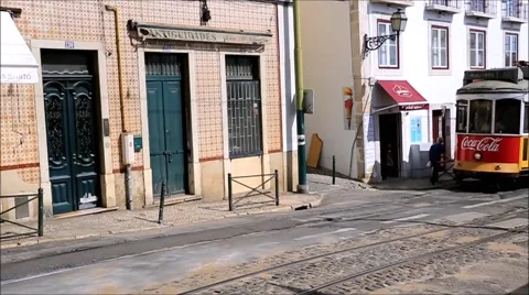 Traditional tram operating in Lisbon Stock Footage 57089197