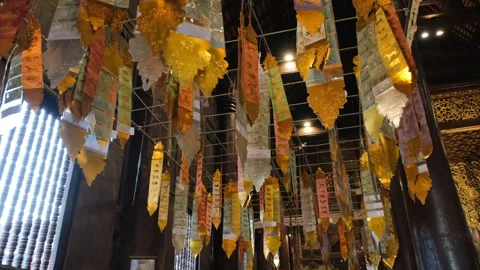Traditional Tung prayer flags inside the temple Vidéo 338268679