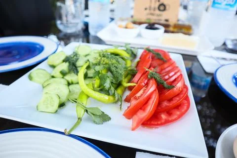 Traditional Turkish Breakfast with vegetables cucumber, tomatoes, green chill Foto stock
