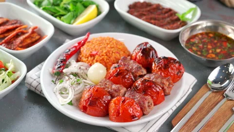 Traditional Turkish meal kebab on table top view Stock Footage 226564586