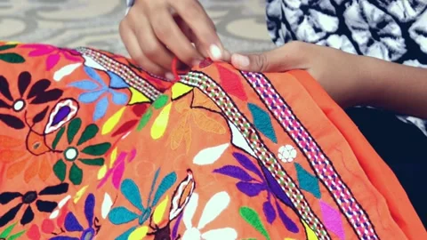 Traditional type pattern sewing embroidery pattern close up view,Girl doing embr Stock Footage 136931501