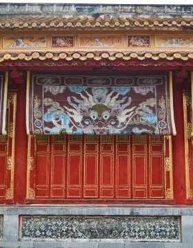 Traditional vietnamese tempel wall with colorful paintings in Hue imperial city Stock Photos