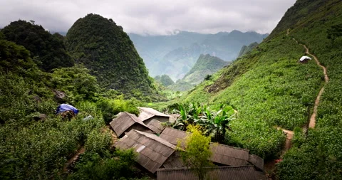 Traditional Vietnamese wooden framed accommodation, Ha Giang loop, aerial Stock Footage 282949566