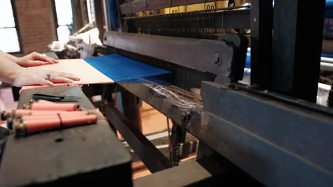 Traditional weaving loom machine producing colorful silk fabric in a vietna.. Stock Footage 336978366