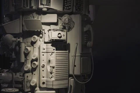 Traditional white communication objects on a wall. Light effect and shadows Stock Photos