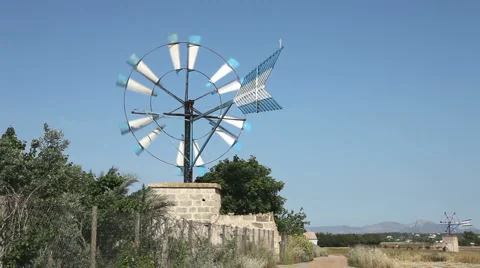 Traditional windmill water pump in Mallorca Stock Footage 5164974