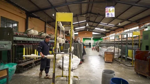 Traditional Wool Textile Factory Processing Yarn and Fiber Production_31.mov Stock Footage 334402935