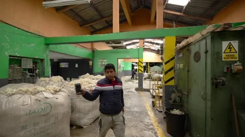 Traditional Wool Textile Factory Processing Yarn and Fiber Production_46.mov Stock Footage 334403565