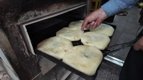 Traditional Xizhou Baba Baking Process in Dali, Yunnan, China, Handmade Fla.. Stock Footage 340516549