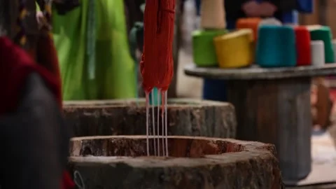 Traditional Yarn Dyeing Process in Textile Workshop Creating Colorful Fibers Stock-Footage 327301223