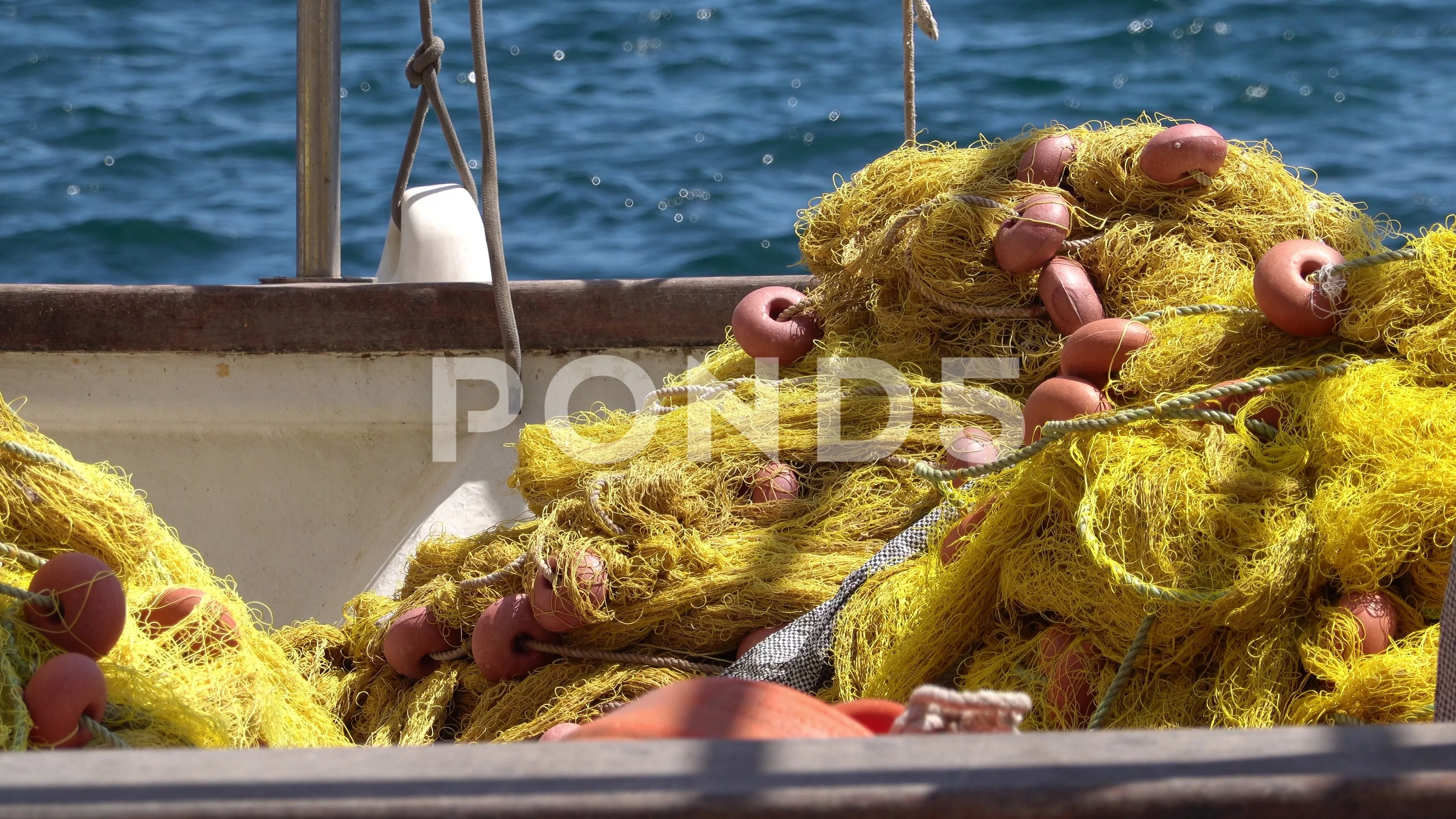 Fisherman Repairs Fishnets and Fishing Lines - Free HD Video Clips