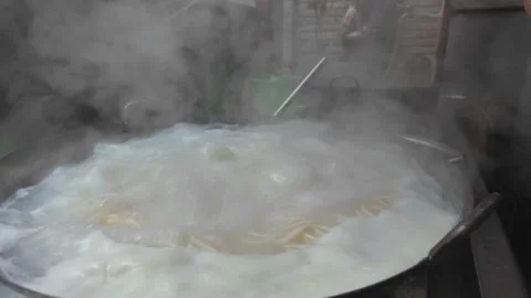 Traditional Yigen Mian One-Root Noodles Being Hand Pulled in Weishan, Yunna.. Stock Footage 340517250