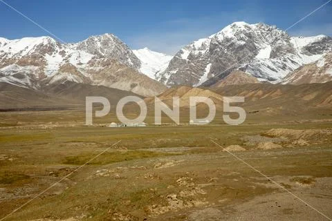 Traditional Yurts in Tien Shan alpine meadow Stock Photos