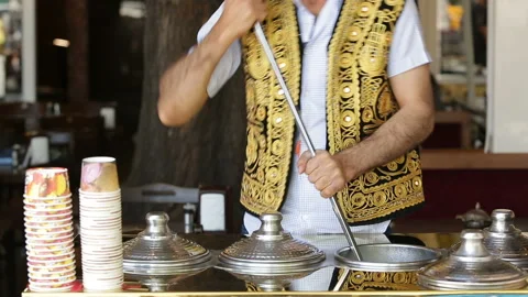 Traditionally dressed man prepare Turkish ice cream in Istanbul streets. Stock Footage 149962247