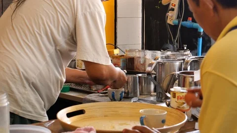 Traditionally make hot drinks 스톡 동영상 120620117