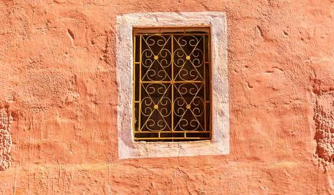 Tradititional arabic style decorated window frame in old town kasbah wall,... Stock Photos