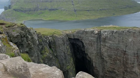 Traelanipa Cliff with Sorvagsvatn lake Stock Footage