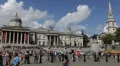 Trafalgar Square People Pedestrians Tourists Visiting Walking Passing, London UK HD Footage