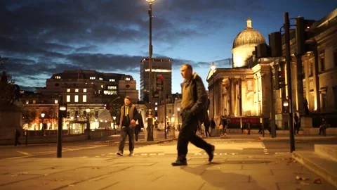 Trafalgar Square rush hour during coronavirus second lockdown Stock Footage