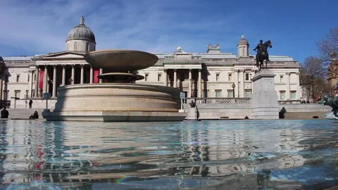 Trafalgar Square Water - Fairly empty due to coronavirus pandemic Stock Footage 146935383