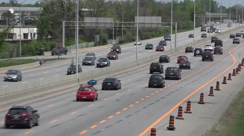 Traffic on a 4 lane highway Stock Footage 50180176
