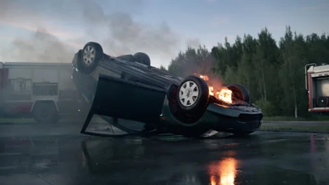 Traffic Accident with Burning Car Stock Footage 295789204