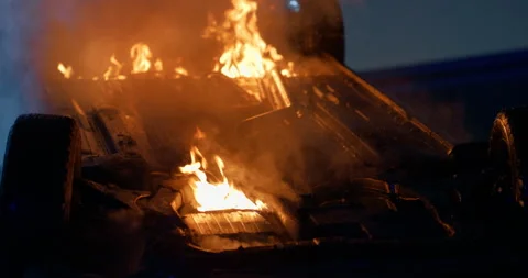 Traffic Accident with Burning Car Stock Footage 295796452